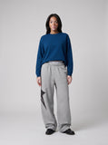 DAXUEN dark blue bold back graphic long-sleeved crew top — model photo