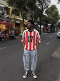 DAXUEN red and white striped oversized knit top with black '17' graphic — model photo