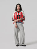 DAXUEN red and white striped oversized knit top with black '17' graphic — model photo