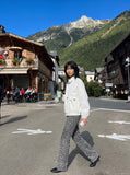 DAXUEN black and white oversized bomber jacket — model photo
