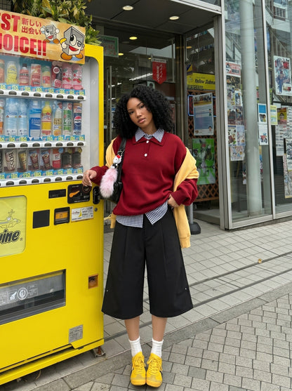 DAXUEN Black wide-leg cropped trousers with pleats and studs — model photo