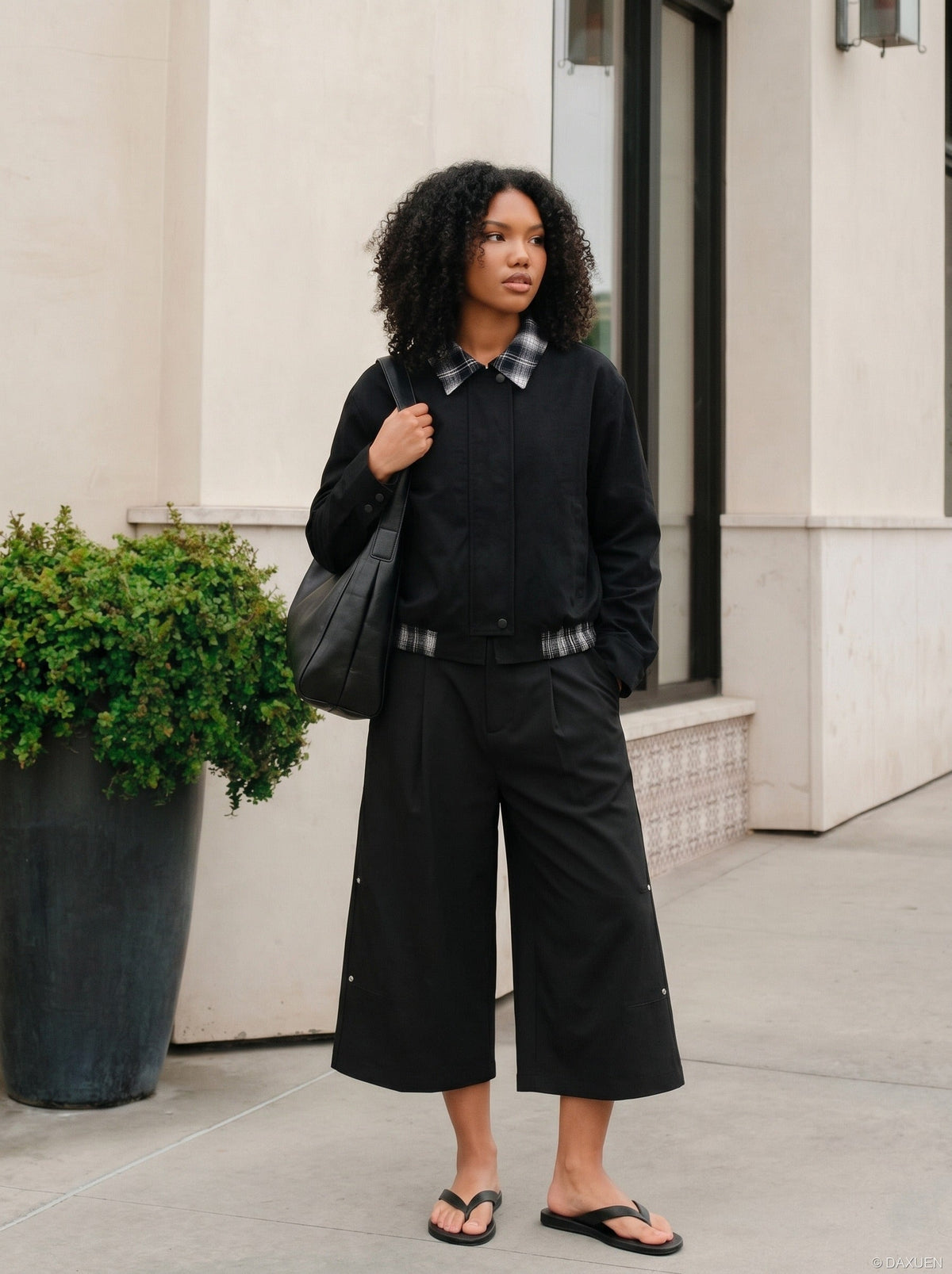 DAXUEN Black wide-leg cropped trousers with pleats and studs — model photo