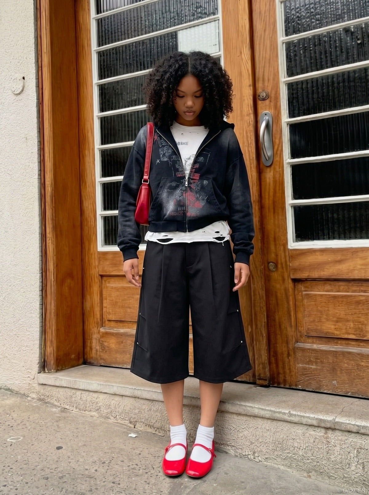 DAXUEN Black wide-leg cropped trousers with pleats and studs — model photo