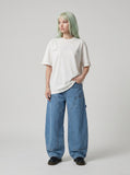 DAXUEN white oversized bold block lettering graphic tee — model photo