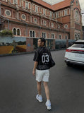 DAXUEN Short-sleeved relaxed-fit jersey t-shirt with graphics — model photo