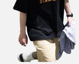 DAXUEN black oversized bold brown-orange wordmark graphic t-shirt