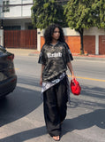 DAXUEN dark camouflage oversized jersey top — model photo