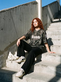 DAXUEN dark camouflage oversized jersey top — model photo