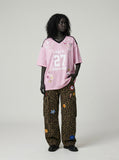 DAXUEN pink oversized cartoon graphic jersey tee — model photo