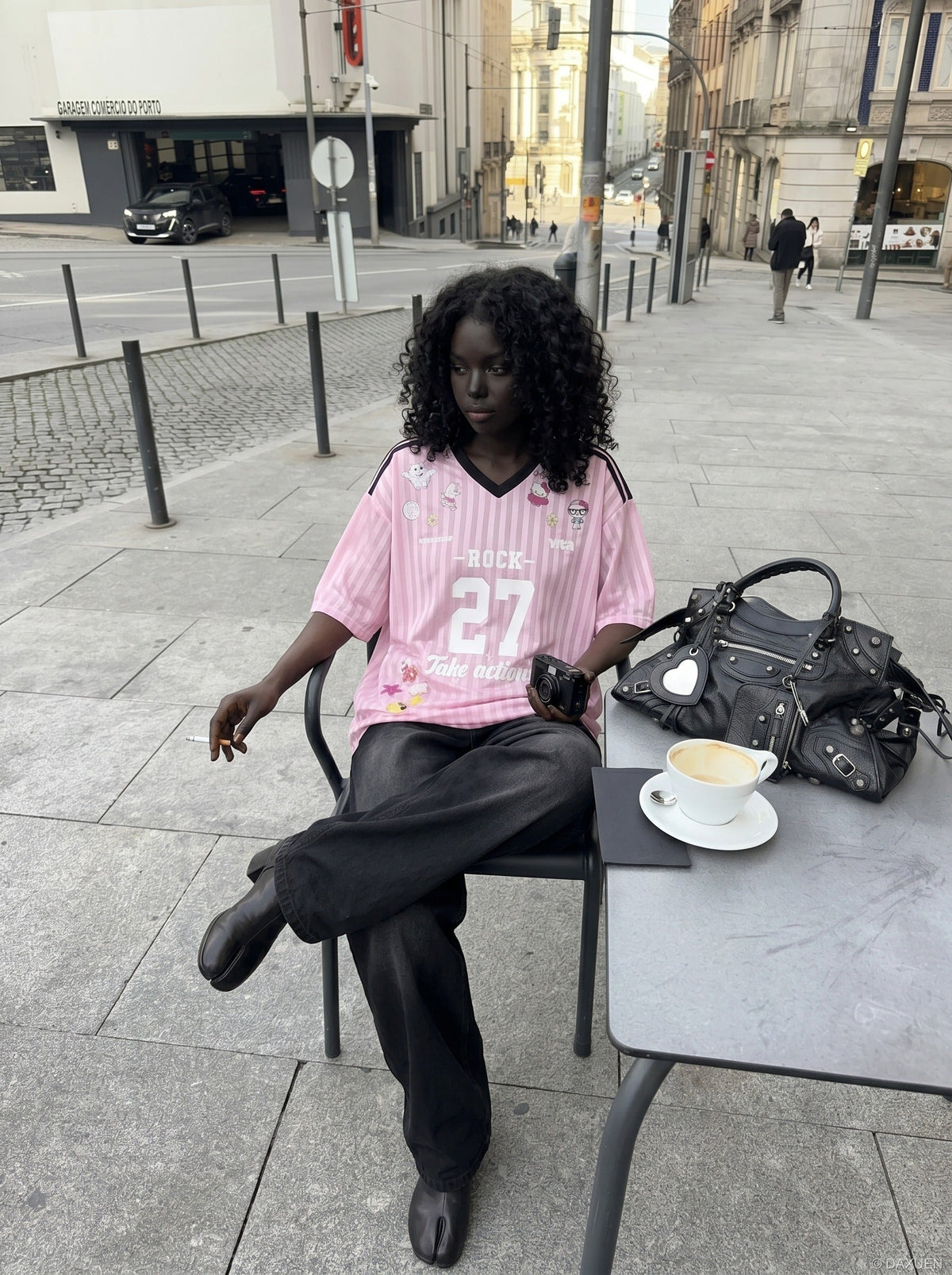 DAXUEN pink oversized cartoon graphic jersey tee — model photo