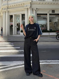 DAXUEN Color-blocked graphic T-shirt with raglan sleeves — model photo