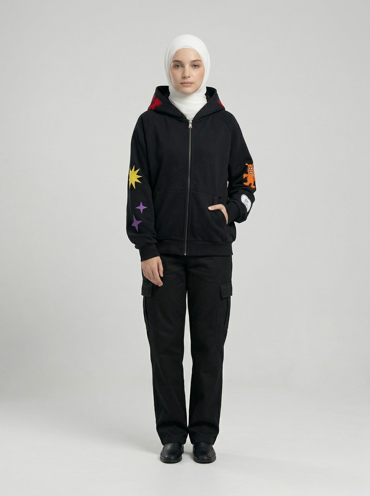 DAXUEN Embroidered hoodie jacket with colorful graphics — model photo