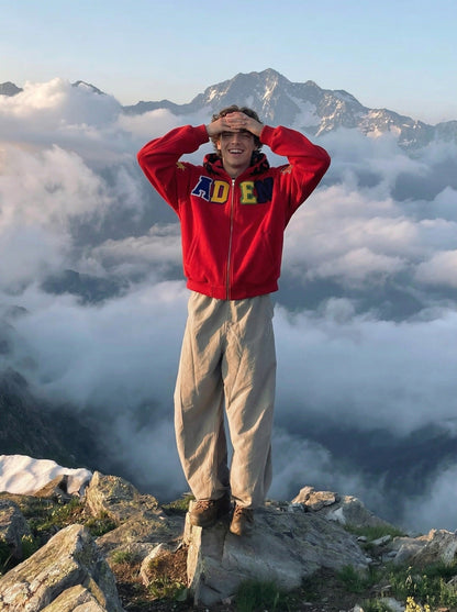 DAXUEN Embroidered hoodie jacket with colorful graphics — model photo