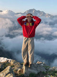 DAXUEN Embroidered hoodie jacket with colorful graphics — model photo