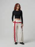 DAXUEN Wide-leg pants with red cross graphic and adjustable drawstrings — model photo