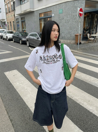 DAXUEN Short-sleeved embroidered T-shirt in black and white — model photo