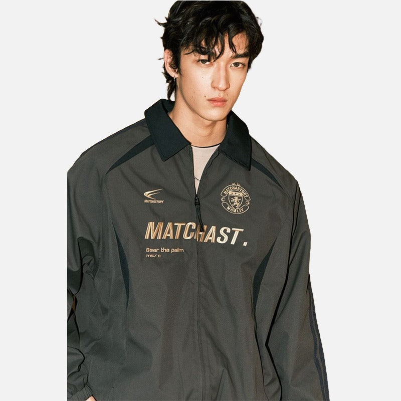 DAXUEN charcoal grey zip jacket with gold text