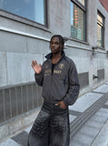 DAXUEN charcoal grey zip jacket with gold text — model photo