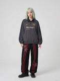 DAXUEN charcoal grey zip jacket with gold text — model photo