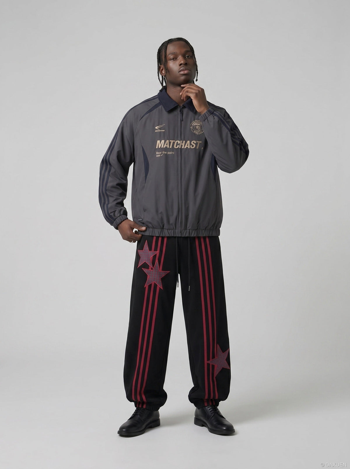 DAXUEN charcoal grey zip jacket with gold text — model photo