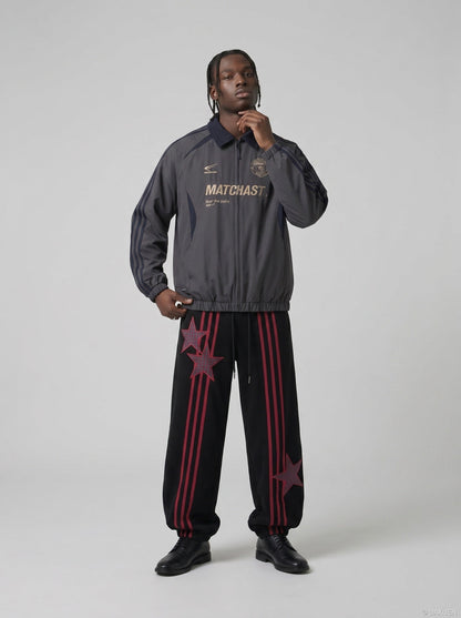 DAXUEN charcoal grey zip jacket with gold text — model photo