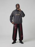 DAXUEN charcoal grey zip jacket with gold text — model photo