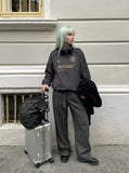 DAXUEN charcoal grey zip jacket with gold text — model photo