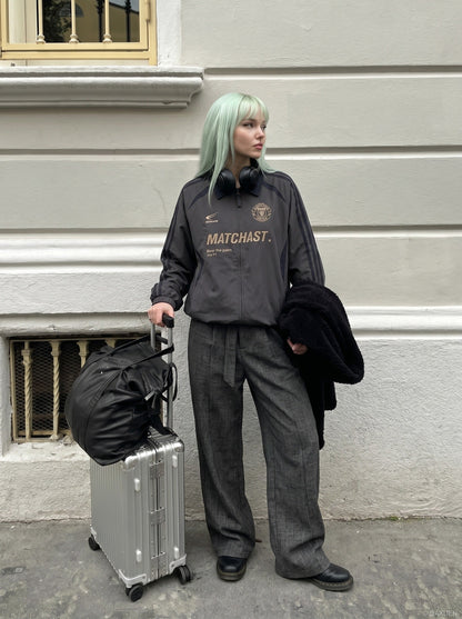 DAXUEN charcoal grey zip jacket with gold text — model photo