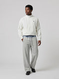 DAXUEN Full-zip jacket with gothic logo — model photo