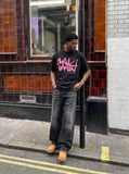 DAXUEN Bold graffiti text short-sleeve T-shirt in black and white — model photo