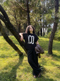 DAXUEN black oversized bold-graphic 33 t-shirt — model photo