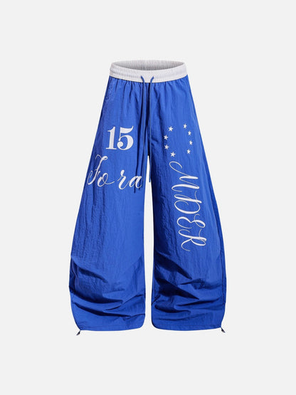 DAXUEN Oversized wide-leg track pants with graphic prints