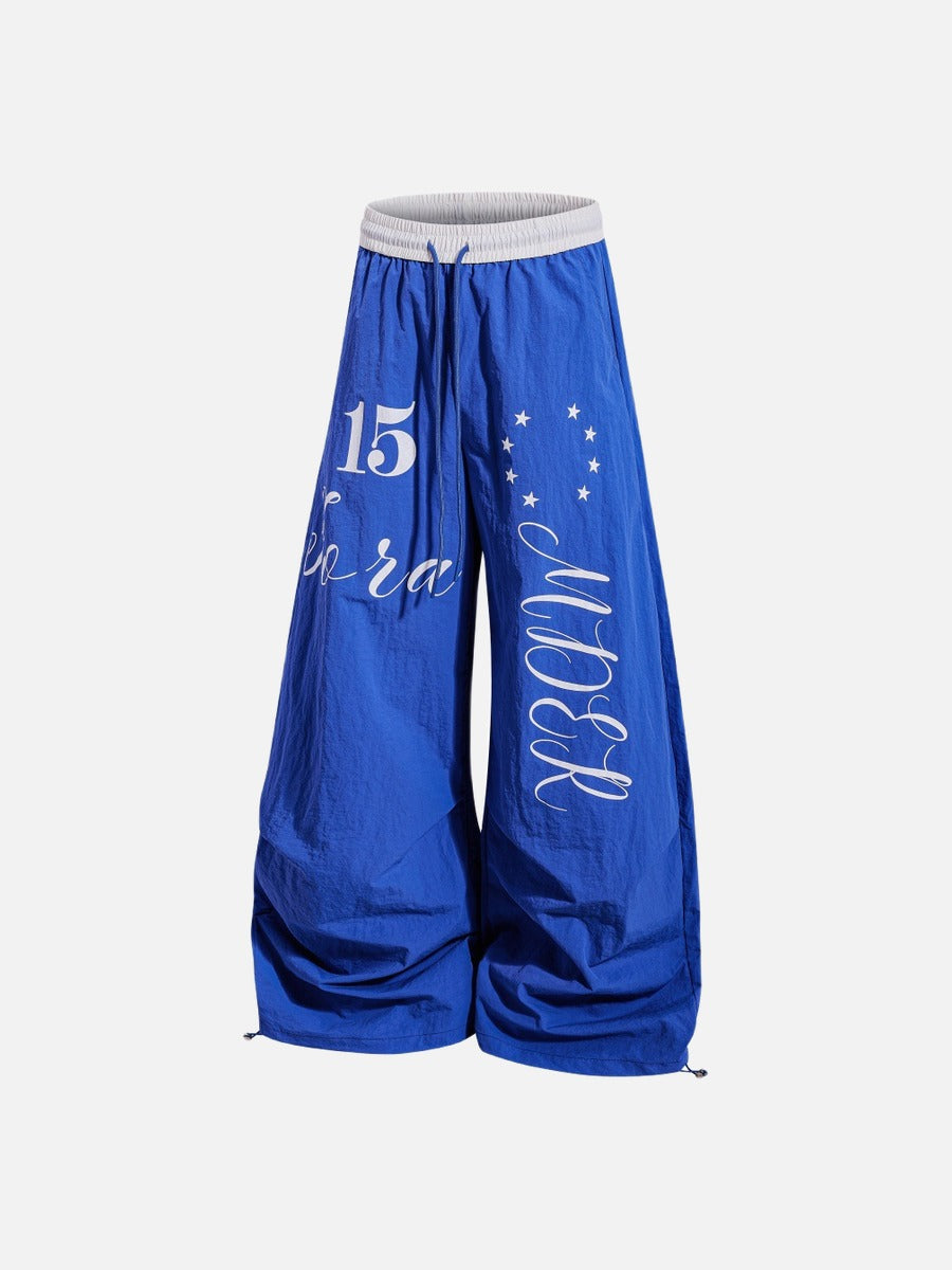 DAXUEN Oversized wide-leg track pants with graphic prints