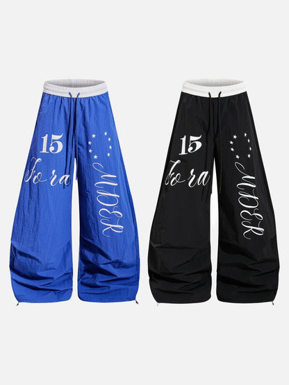 DAXUEN Oversized wide-leg track pants with graphic prints