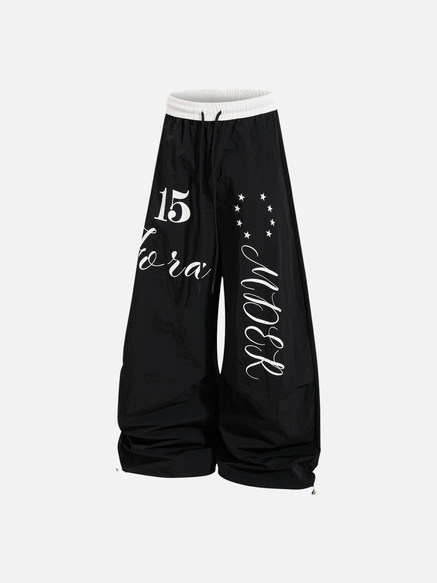 DAXUEN Oversized wide-leg track pants with graphic prints