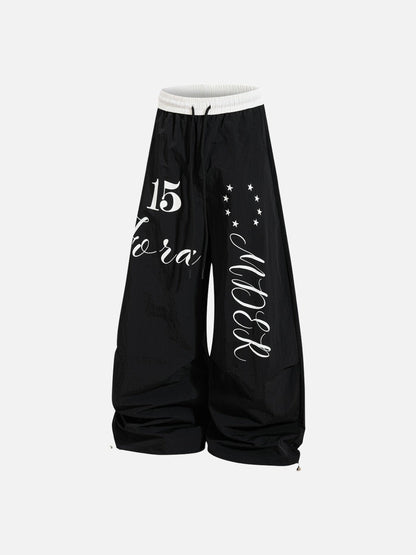 DAXUEN Oversized wide-leg track pants with graphic prints