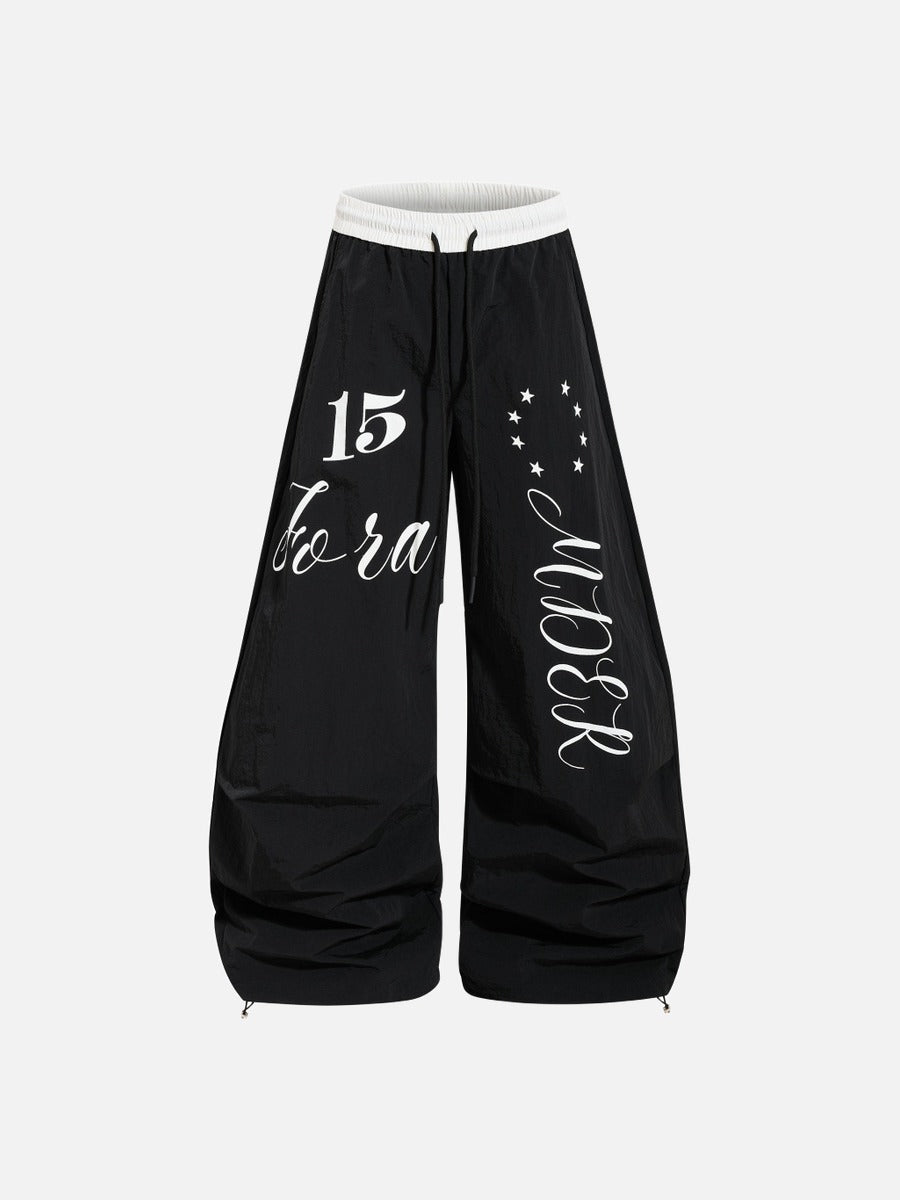 DAXUEN Oversized wide-leg track pants with graphic prints
