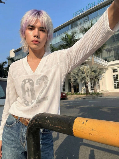 DAXUEN Long-sleeved top with graphic prints and ribbed texture — model photo