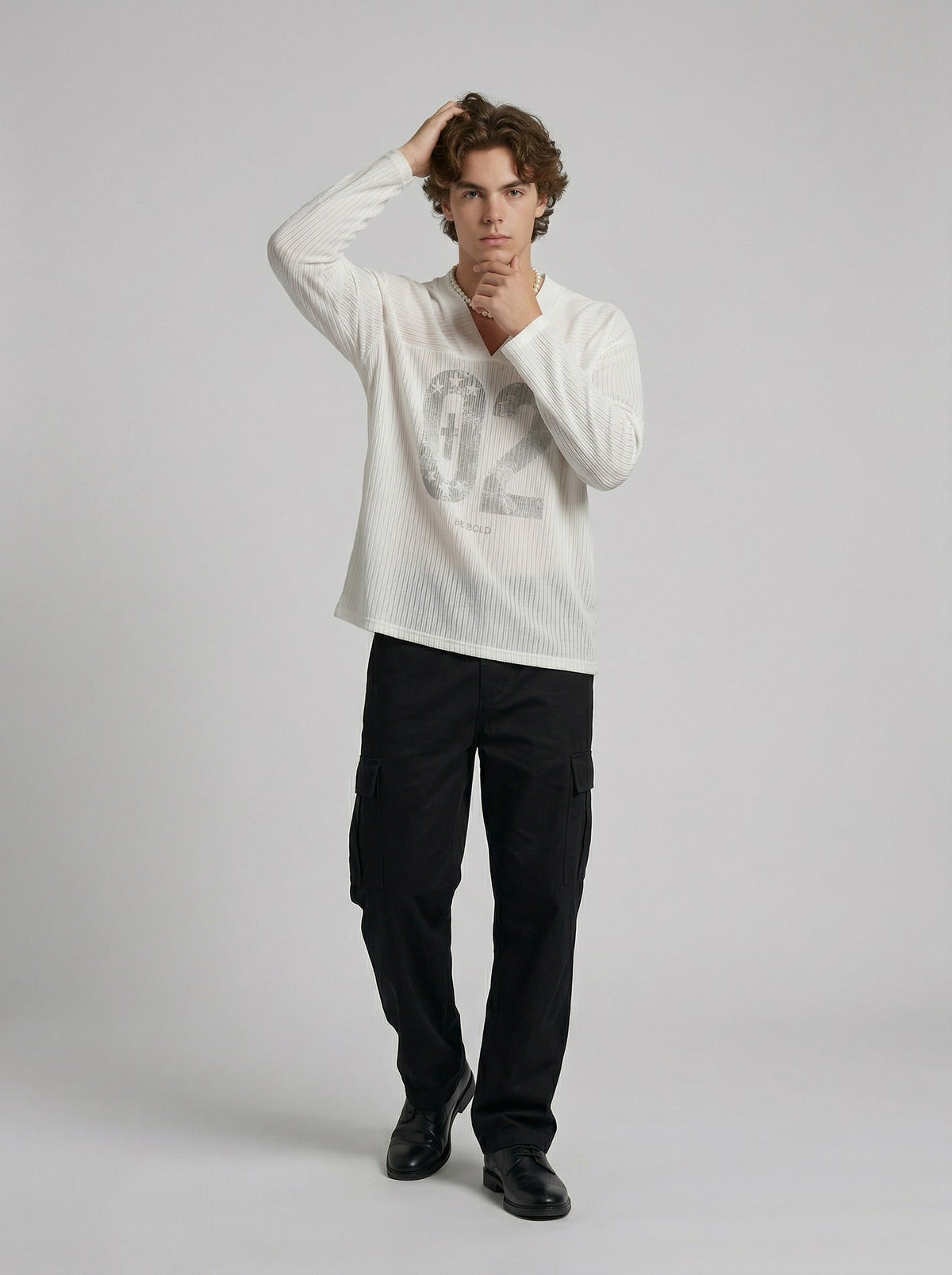 DAXUEN Long-sleeved top with graphic prints and ribbed texture — model photo