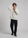 DAXUEN Long-sleeved top with graphic prints and ribbed texture — model photo