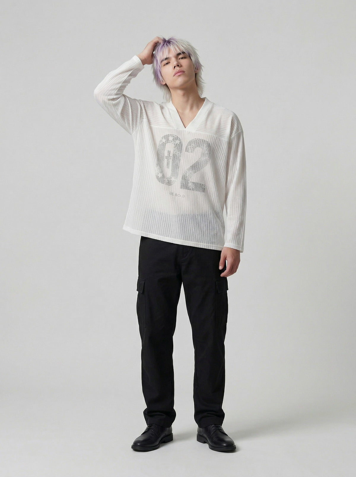 DAXUEN Long-sleeved top with graphic prints and ribbed texture — model photo