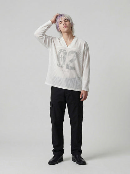 DAXUEN Long-sleeved top with graphic prints and ribbed texture — model photo