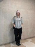 DAXUEN Oversized short-sleeved polo shirt with graphic print — model photo