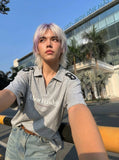 DAXUEN Oversized short-sleeved polo shirt with graphic print — model photo