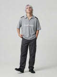 DAXUEN Oversized short-sleeved polo shirt with graphic print — model photo
