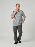 DAXUEN Oversized short-sleeved polo shirt with graphic print — model photo