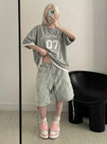 DAXUEN Oversized heather grey short-sleeve t-shirt with graphic print — model photo