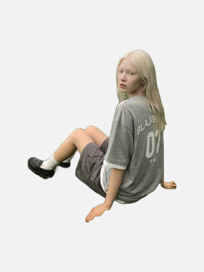 DAXUEN Oversized heather grey short-sleeve t-shirt with graphic print — model photo