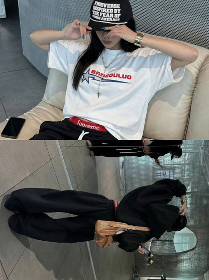 DAXUEN Bold graphic oversized t-shirt in black and white — model photo