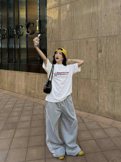 DAXUEN Bold graphic oversized t-shirt in black and white — model photo